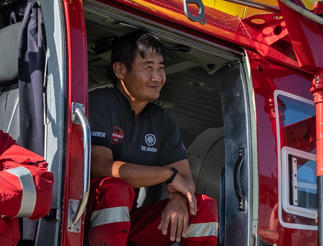 Tatsu sitting in the helicopter