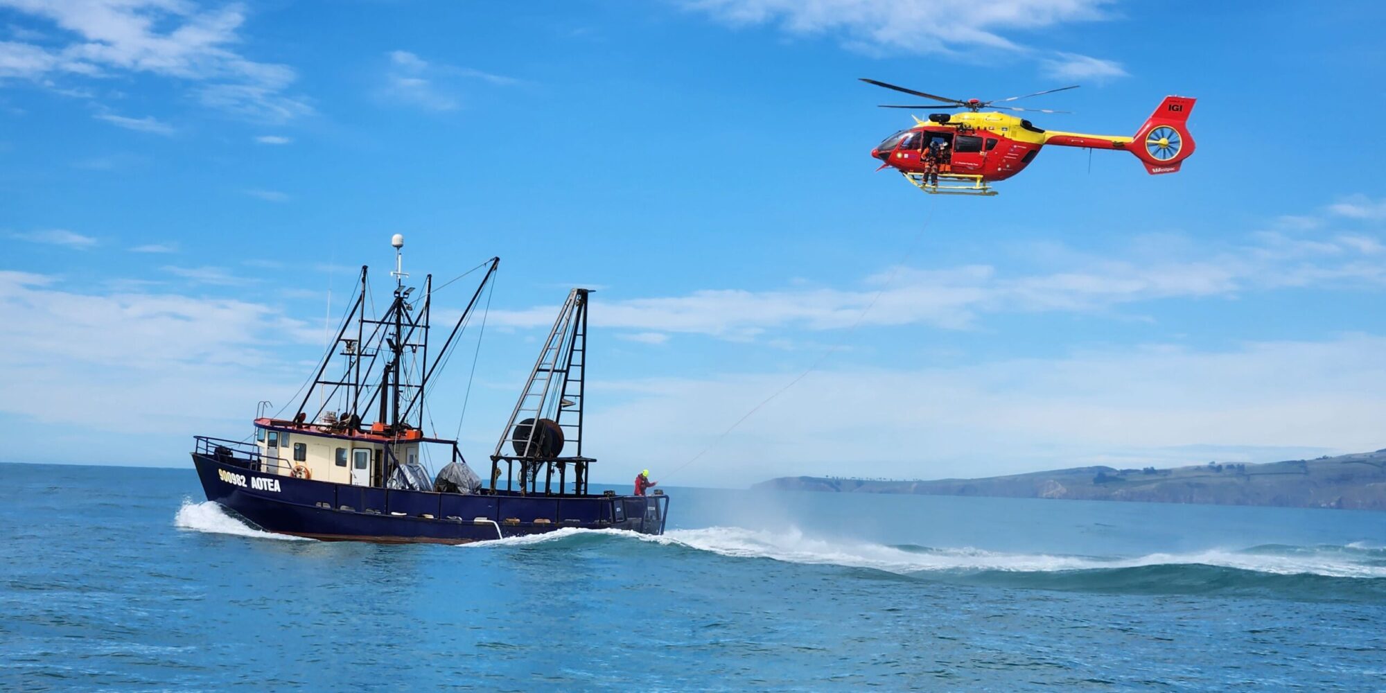 Helicopter winching from a fishing boat