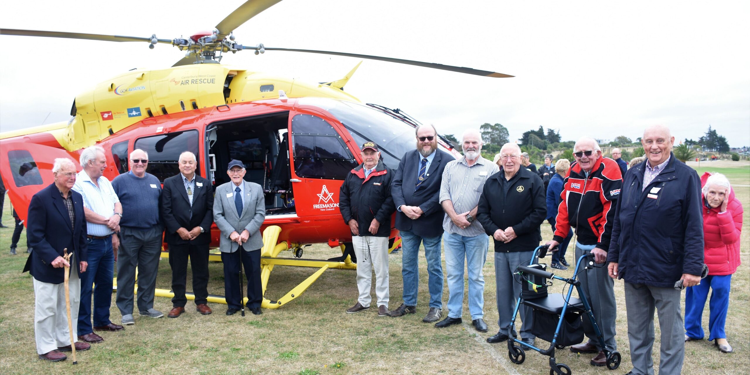 Group of Timaru locals in front of the helicopter