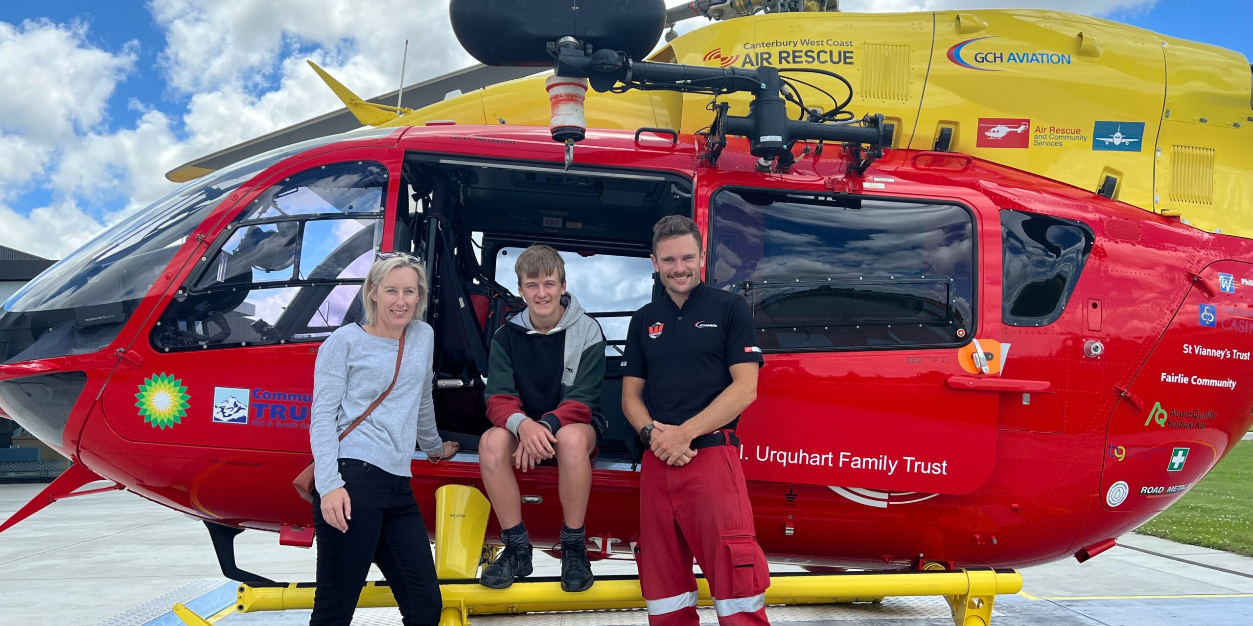Dale, Carrie and Tom by the helicopter