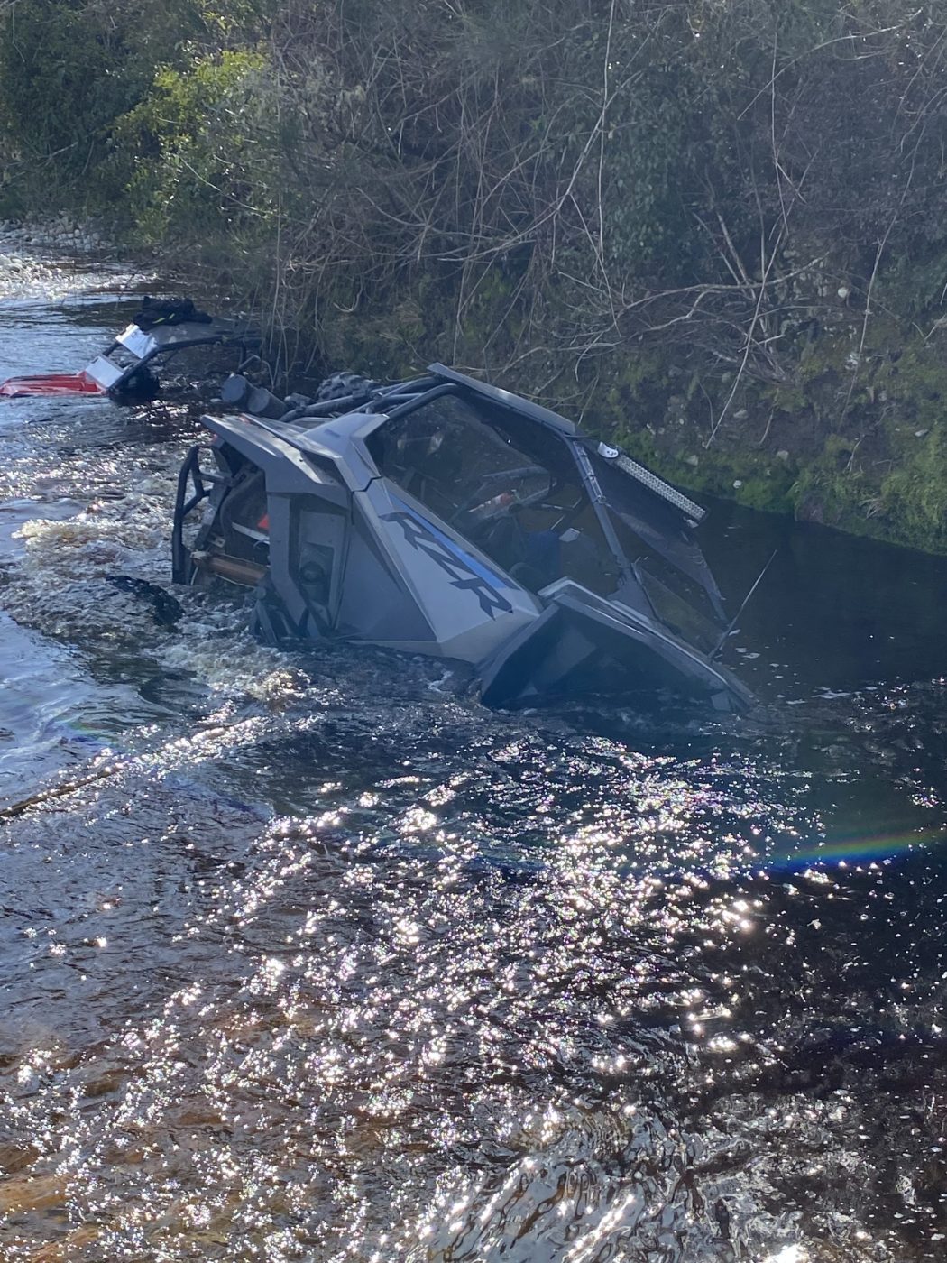 ATV in the river