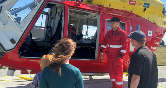 Emma and Cooper have a tour of the rescue helicopter